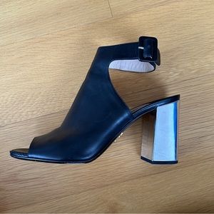 Prada open toe bootie with silver heels